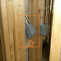 Switch junction box not installed to wall framing found during home inspection in Conroe, TX 
